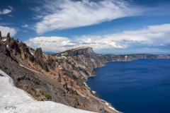 crater-lake-rocky-rim-with-clouds